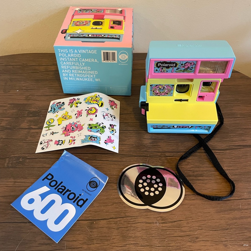 Polaroid Instant Camera - Blue, Yellow, Pink Open box